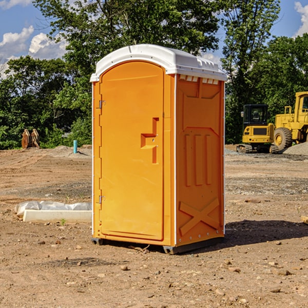 how often are the portable restrooms cleaned and serviced during a rental period in Rugby